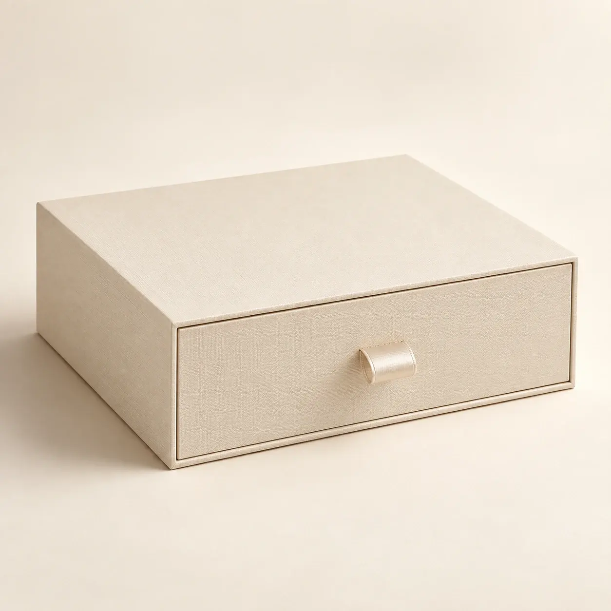 Champagne-toned Luxe drawer presentation box with ribbon pull